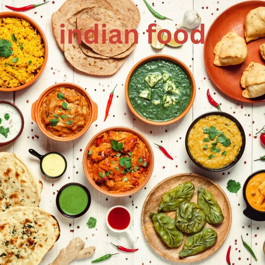 A thali of Indian food is shown which includes curry, rice, roti, samosas, palak paneer, daal and chutney etc.