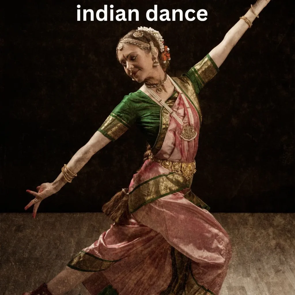 Female artist in traditional Indian costume performing classical dance is shown